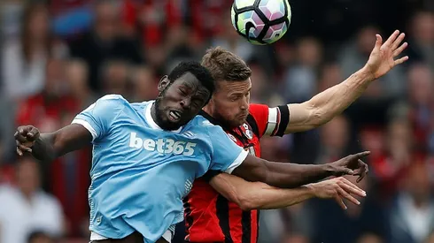 Two own goals as Bournemouth ensure safety