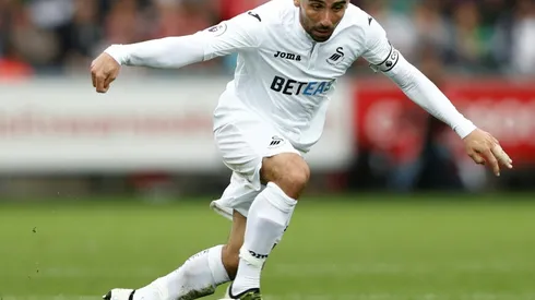 Swansea captain Britton signs new deal