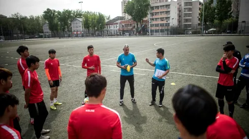 Pork, sweets off menu for 'fat' Chinese footballers as Spanish take charge