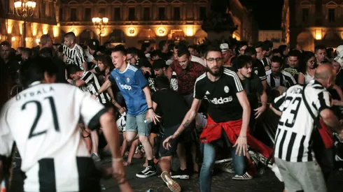 Fan dies after Champions League stampede in Turin