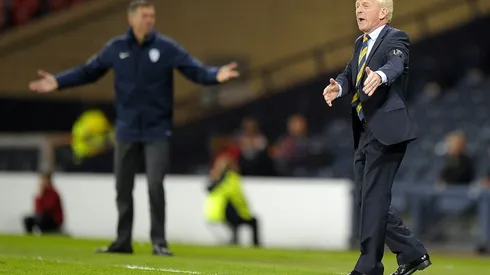 Football: Strachan calls for calm heads against England