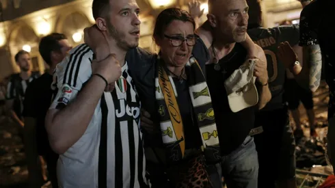 30 injured in Juventus fan panic after bomb scare