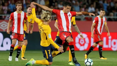 Atletico defy Griezmann red card to salvage Girona draw