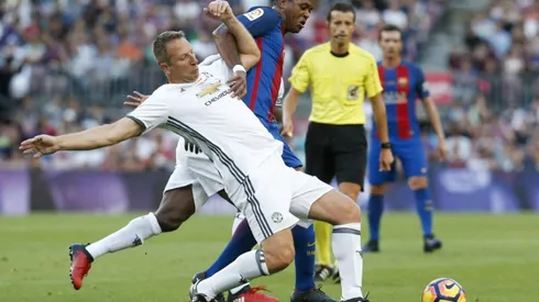 Former Barca stars Kluivert, Davids appear at Mugabe rally