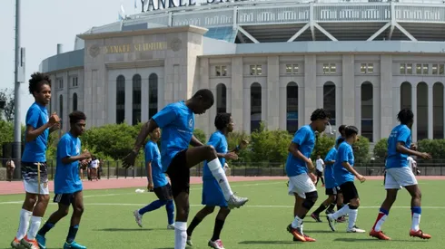 Threatened by Trump, but united by football