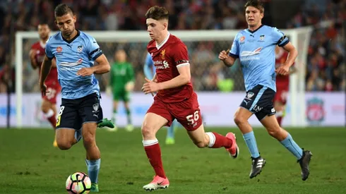 Liverpool youngster Woodburn pens new deal