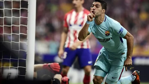 Suarez earns Barca point at Atletico, Ronaldo rescues Real