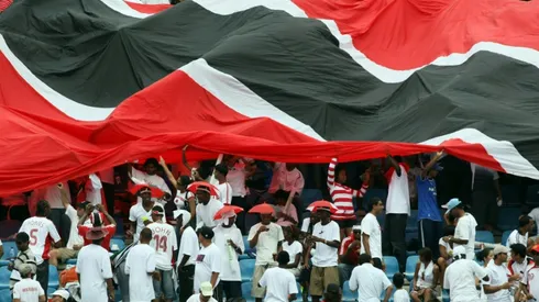 Trinidad insist US game on despite water-logged pitch
