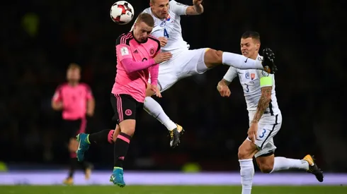 Last-gasp Scotland keep World Cup dream alive