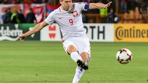 Record man Lewandowski fires Poland to brink of World Cup
