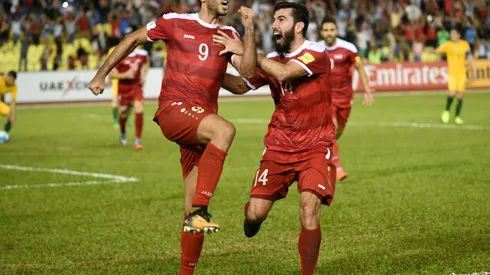 Football: Disputed penalty lifts Syria World Cup hopes