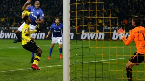 Dortmund throw away four-goal lead to draw derby