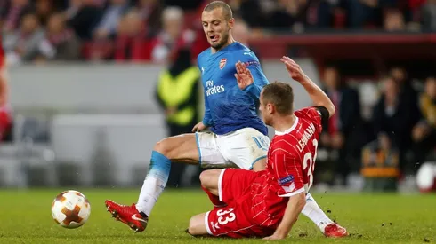 Arsenal lose at Cologne, Milan make last 32