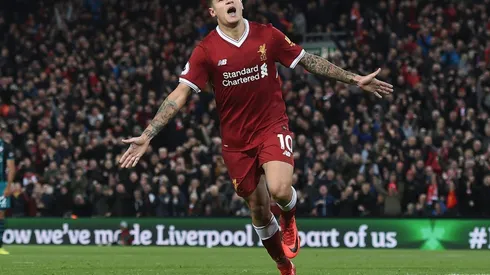Focused Coutinho heals Liverpool rifts