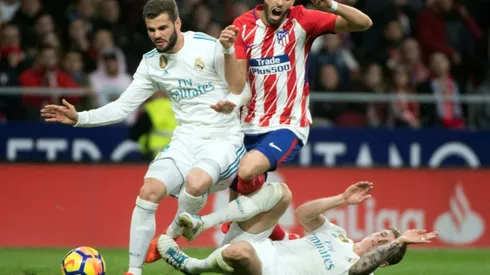 Derby stalemate leaves Real 10 points behind Barcelona