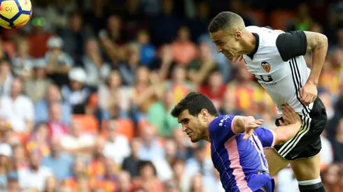 Alcacer double edges Barca past Sevilla