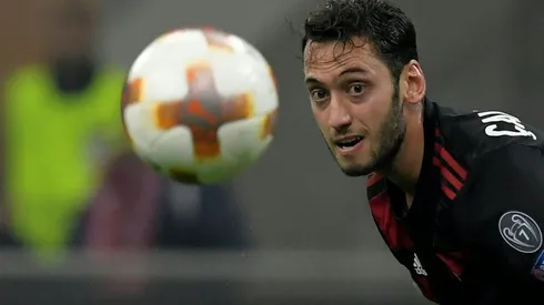 Milan's Calhanoglu snatches point in Florence