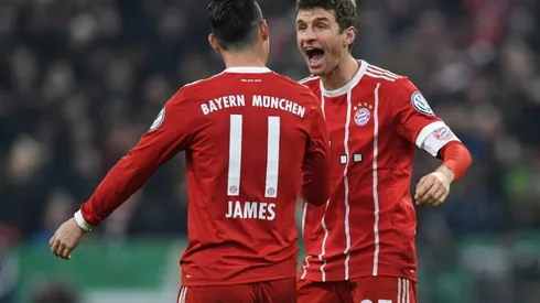 Mueller helps Bayern battle past Dortmund