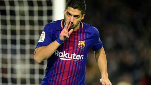 Suarez, Paulinho move Barcelona 11 clear of Real Madrid