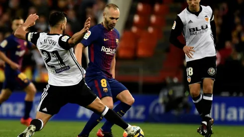 Iniesta sidelined by calf strain