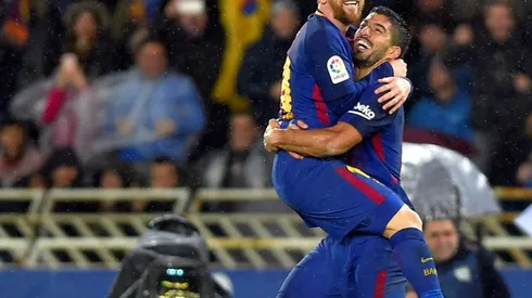 Suarez fires Barcelona nine clear in Sociedad fightback