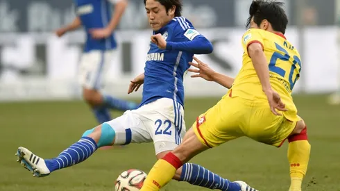 Japan pin-up Uchida returns home after Germany spell