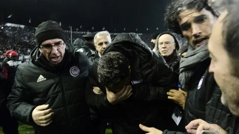 Olympiakos coach Garcia keen to forget paper roll injury