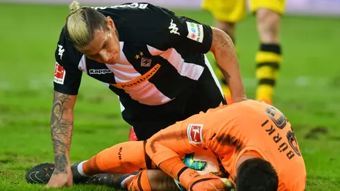 Pitch battle as Reus ends goal drought in Dortmund win