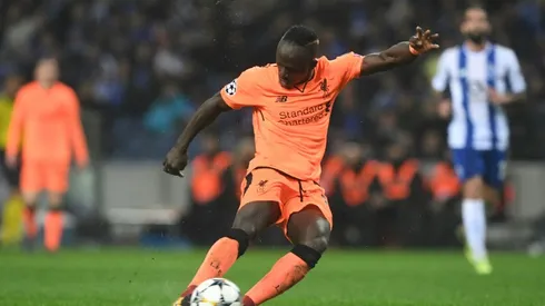 Mane steps out from Salah's shadow for historic hat-trick