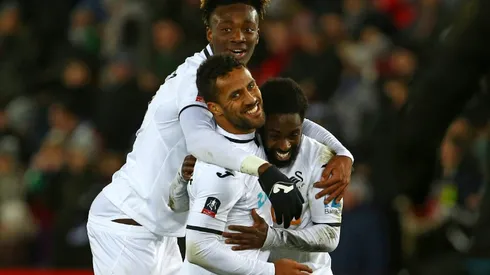 Swansea hit eight in FA Cup rout, Huddersfield advance