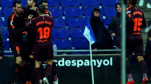 Pique strikes late to keep Barcelona unbeaten