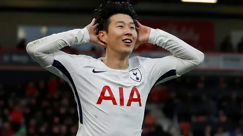 Spurs shrug off Kane injury, Arsenal silence Watford's Deeney