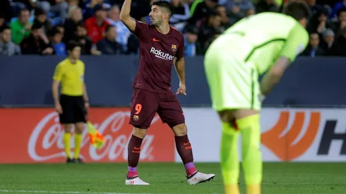 Barcelona stroll past Malaga without Messi