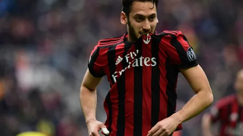 AC Milan back winning in Bologna to keep Europa League push alive