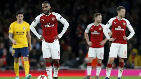 Profligate Arsenal punished by 10-man Atletico Madrid