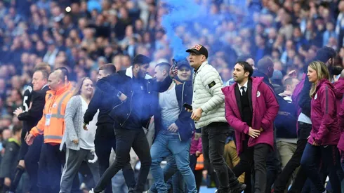 Guardiola unconcerned by celebratory Man City pitch invasion