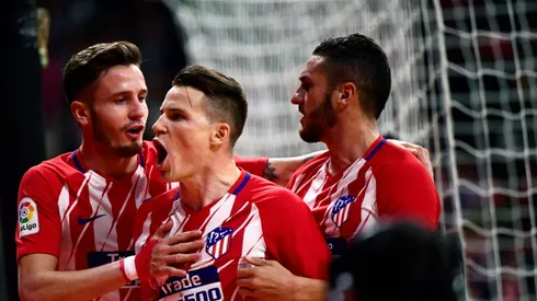 Gameiro penalty edges Atletico past Deportivo, closer to Barca