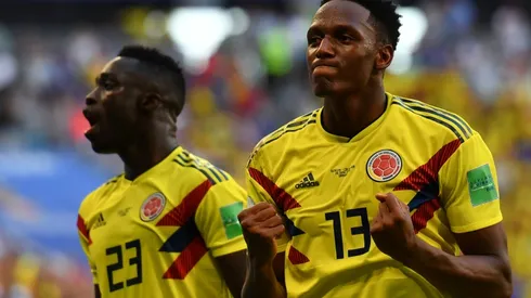Mina sends Colombia through as ill-disciplined Senegal exit World Cup