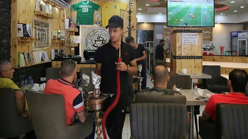 Iraqis buy into World Cup fever, without breaking the bank