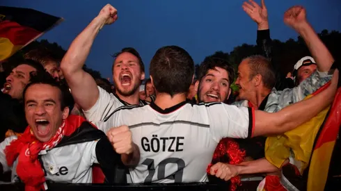 Fans dance in Berlin rain as Germany survive