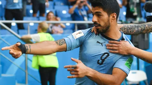 Suarez sends Uruguay into last 16 with hosts Russia