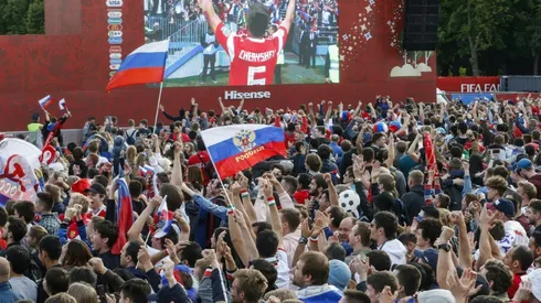 Flag-waving fans party as Russia wins World Cup opener in Moscow