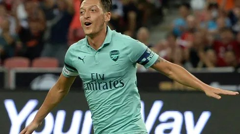 Captain fantastic! Race-row Ozil fires Arsenal to big win over PSG