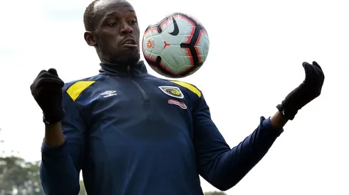 Nervous Bolt prepares for football debut