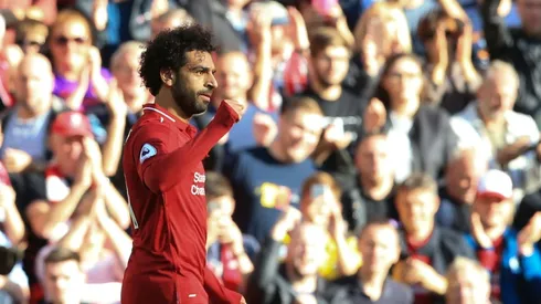 Salah strike beats Brighton to send Liverpool top