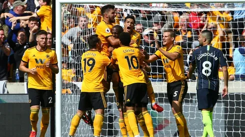 Salah sends Liverpool top, Man City held by Wolves