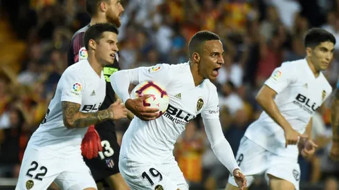 Rodrigo strikes as Atletico held by Valencia in La Liga opener