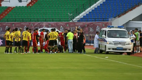 Chinese footballer left stricken as ambulance door jams