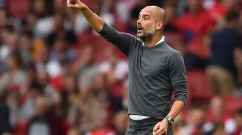 Guardiola salutes City's sacrifice as champs subdue Arsenal
