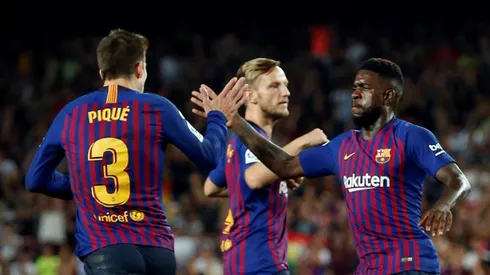 Pique rescues point for 10-man Barca against Girona